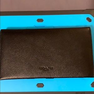 Coach men’s wallet.